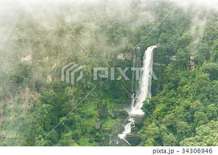 Tad Tiger waterfall in  forest at Bolaven highland 34306946