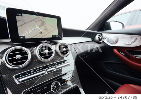 View from inside a car on a part of dashboard with 34307789