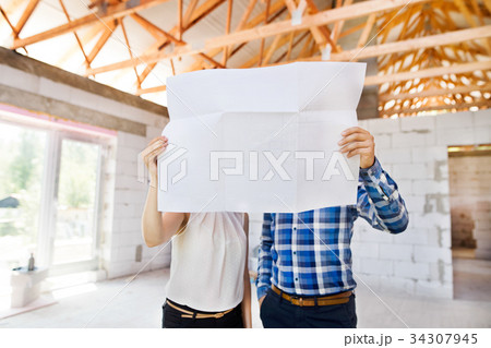 Architects and civil engineer at the construction 34307945