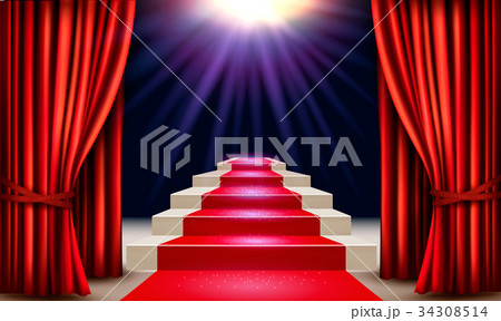 Showroom with red carpet leading to a podium 34308514