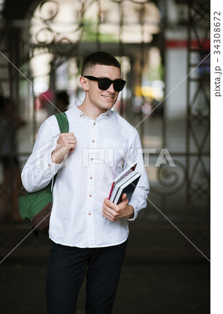 Young stylish student outdoors. Modern youth 34308672