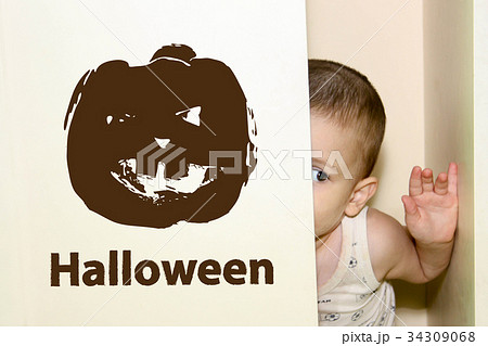 Halloween. the boy is hiding in the closet 34309068
