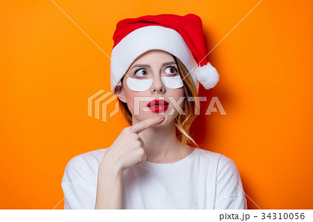 Woman using eye patch for her eyes 34310056