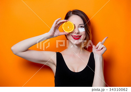 Woman using eye patch for her eyes 34310062