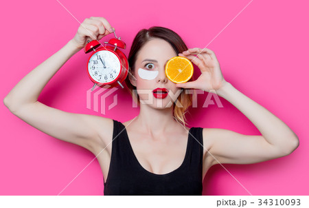 Woman using eye patch for her eyes  34310093