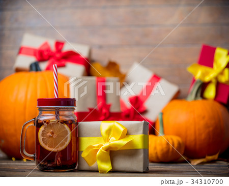 leaves and pumpkin with Halloween gift box and Tea leaves and pumpkin with Halloween gift box and Tea 34310700