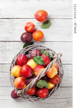 Fresh ripe peaches in basket 34311451