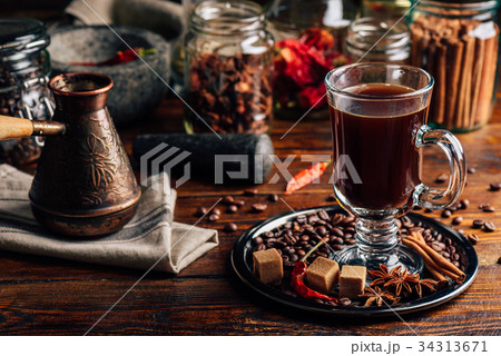 Cezve and Cup of Coffee with Oriental Spices. 34313671