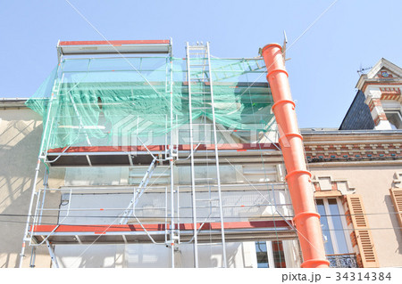 Construction scaffolding of a building Renovation. Construction scaffolding of a building Renovation. 34314384