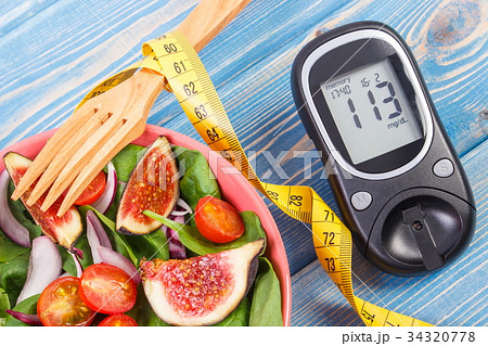 Fruit and vegetable salad and glucometer 34320778