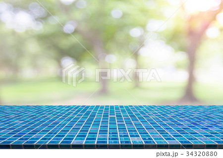 mosaic table with natural bokeh blurred 34320880