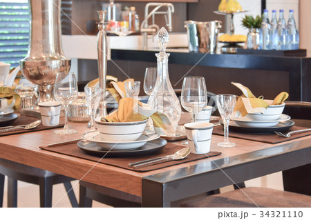 elegant table set in modern style dining room elegant table set in modern style dining room 34321110