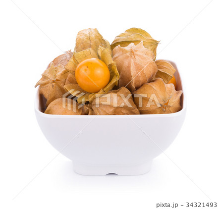 cape gooseberry in bowl on white background 34321493
