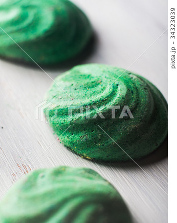 Green Pastel color meringue on white Green Pastel color meringue on white 34323039