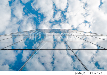 modern business high rise glass building and blue 34325740