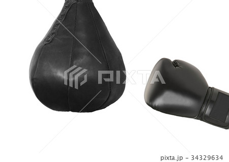 Boxing glove and a punching bag isolated 34329634