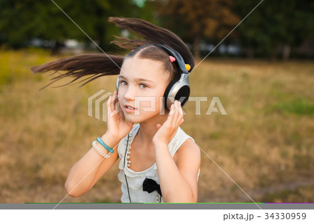 happy girl dancing outdoor 34330959