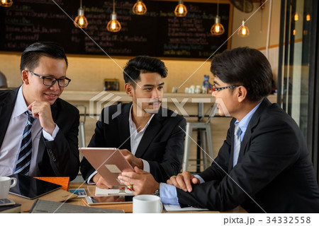 businessman team discuss project at coffee cafe businessman team discuss project at coffee cafe 34332558