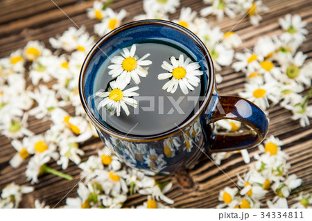 Cup of chamomile tea 34334811