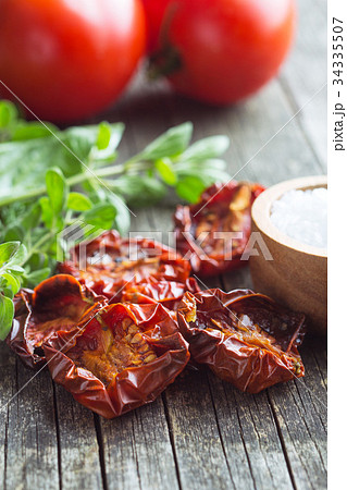 Tasty dried tomatoes and herbs. 34335507