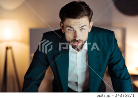 Handsome man posing on camera Handsome man posing on camera 34335971