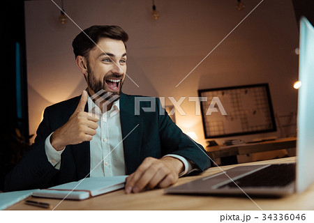 Cheerful man feeling happiness while being in 34336046