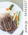 Seared beef staek with green salad from town down  34341057