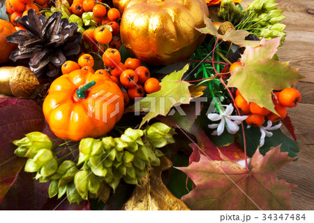 Fall symbols pumpkins, leaves, berries and cones 34347484