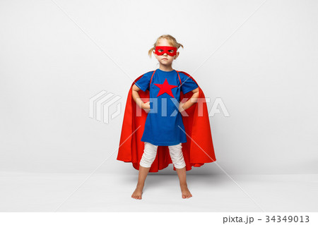 Very excited little girl dressed like superhero Very excited little girl dressed like superhero 34349013