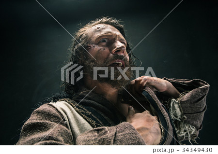 Portrait of a brutal bald-headed viking in a Portrait of a brutal bald-headed viking in a 34349430
