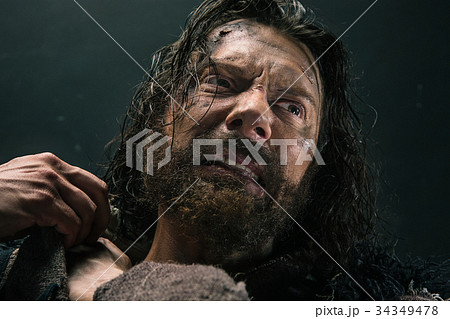Portrait of a brutal bald-headed viking in a Portrait of a brutal bald-headed viking in a 34349478