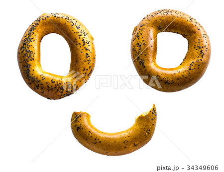 stylized face of bagels on the isolated background 34349606