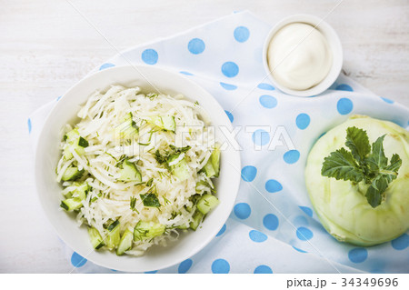 Salad with kohlrabi, cucumber and dill. Salad with kohlrabi, cucumber and dill. 34349696