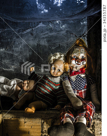 Scary dolls by the window 34355787