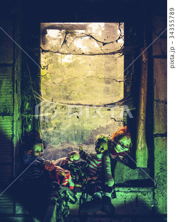 Creepy dolls by the window 34355789