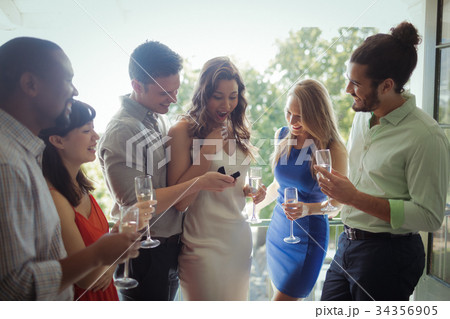 Man proposing woman with engagement ring 34356905