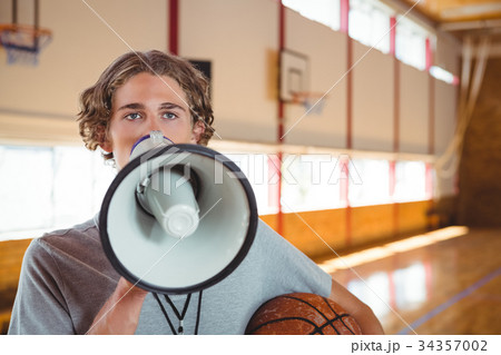 Coach using megaphone Coach using megaphone 34357002