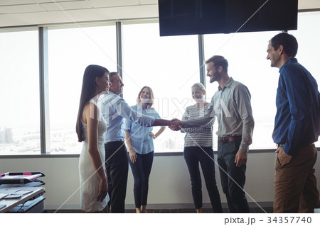 Business people shaking hands Business people shaking hands 34357740