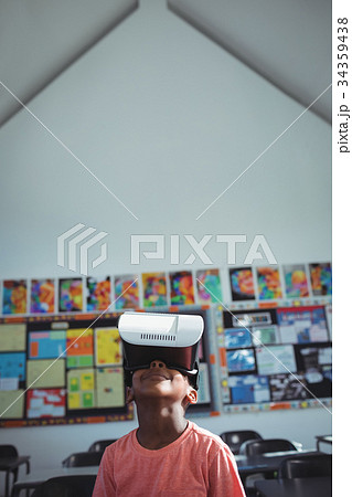 Boy with virtual reality simulator in school 34359438