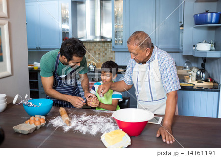 High angle view of family preparing food High angle view of family preparing food 34361191