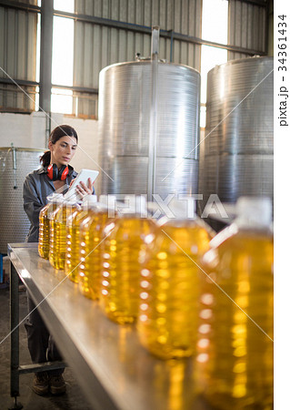 Female worker using digital tablet 34361434