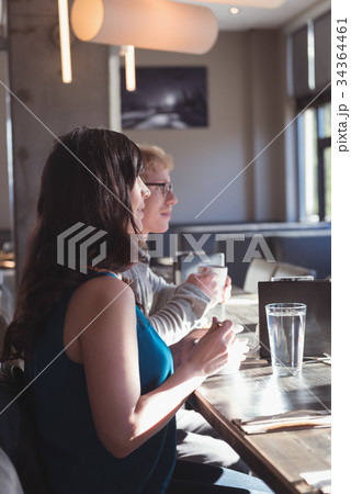 Couple having breakfast in the kitchen 34364461