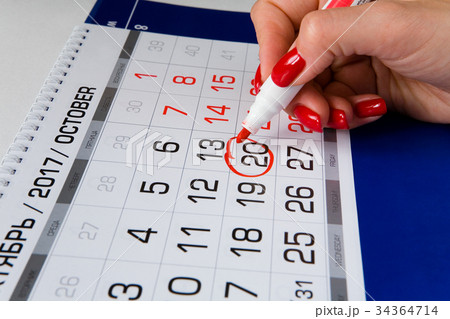 Date is circled with a red marker in the calendar. Date is circled with a red marker in the calendar. 34364714