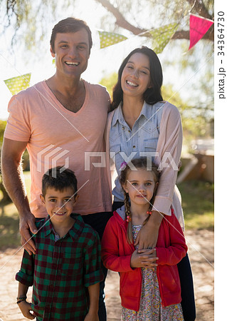 Family enjoying together in the park 34364730