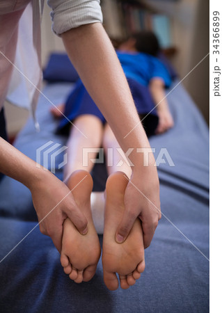 young boy massage Adobe Stock