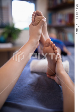 young boy massage Shutterstock