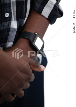 Man wearing smartwatch against white background Man wearing smartwatch against white background 34367906
