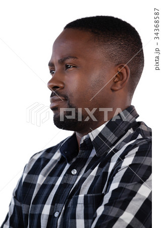 Man standing against white background 34368587