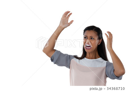 Businesswoman shouting against white background Businesswoman shouting against white background 34368710