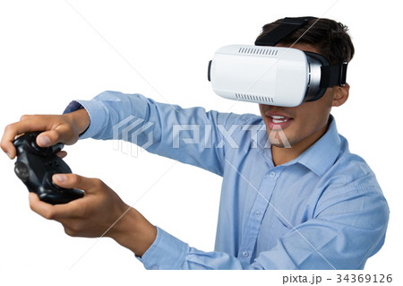 Creative businessman wearing vr glasses while video game Creative businessman wearing vr glasses while video game 34369126